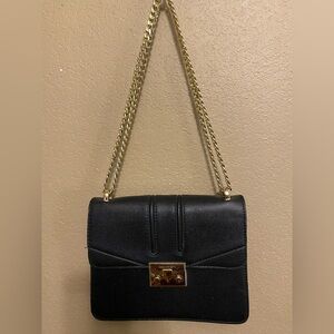Charles & Keith Elegant Black Leather Shoulder Bag with Gold Chain and Clasp